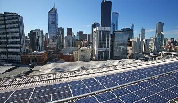 Solar panels against high rises
