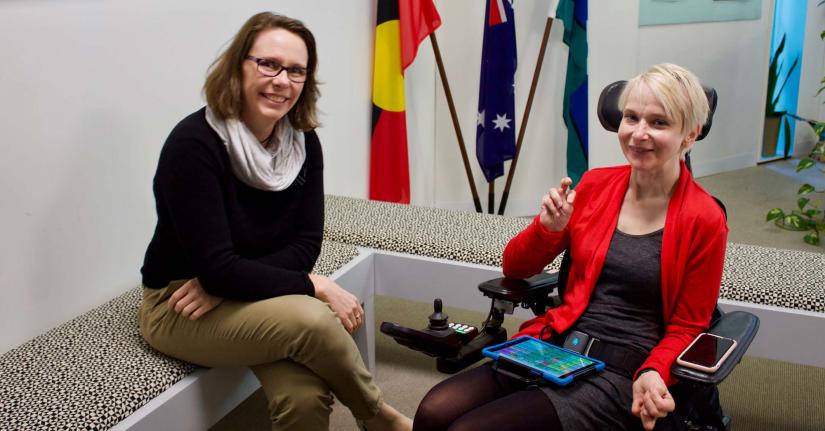 Harmony Turnbull, seated and Fiona Bridger in wheel chair with communication device.