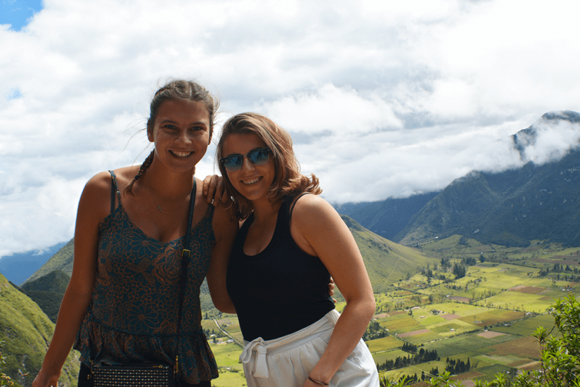 FASS Colombia ICS study tour two girls smiling in front of a mountain valley