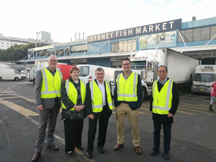 Mike Briers, Anne Astin, Bryan Skepper, Zed Seselja and Ren Ping Liu outside at Sydney Fish Market