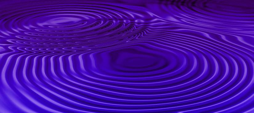 blue and purple ripples colliding