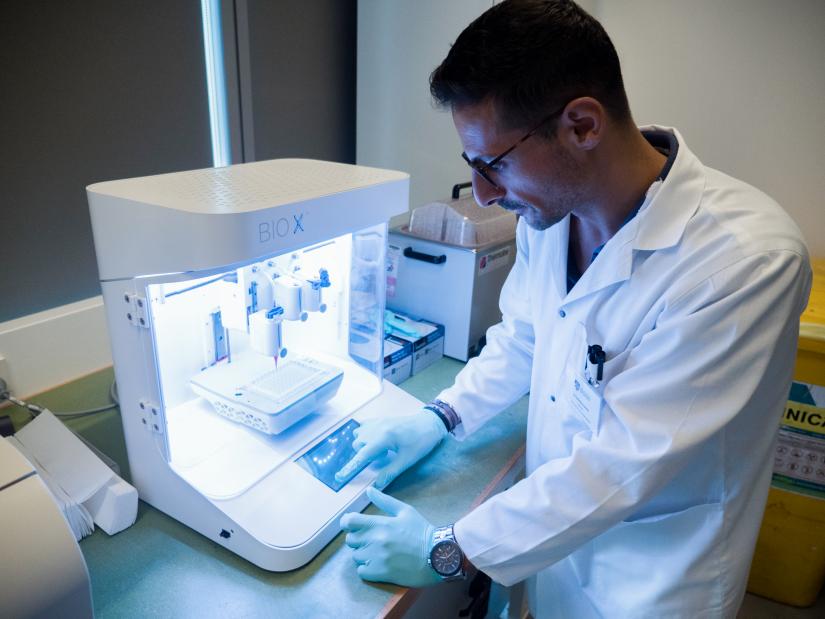 Dr Carmine Gentile with a 3D bio printer