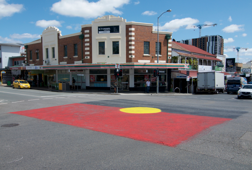 Aboriginal flag on pavement