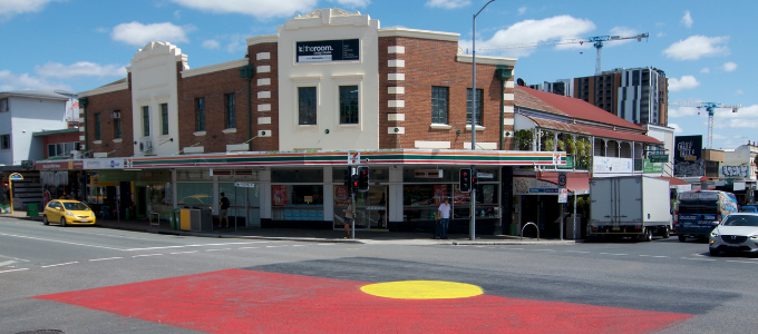 Aboriginal flag on pavement