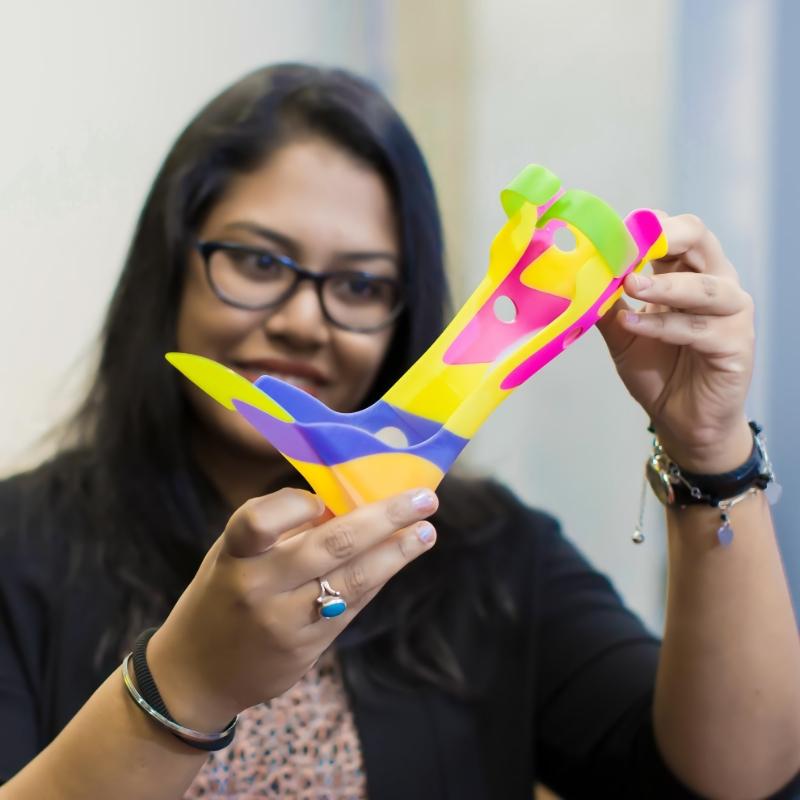 UTS researcher inspects a 3D-printed shoe