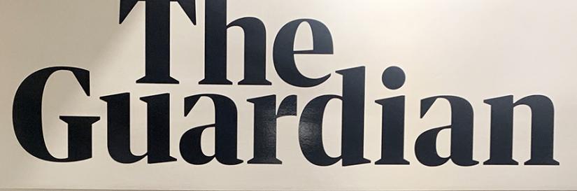 Close-up photograph of the Guardian signage