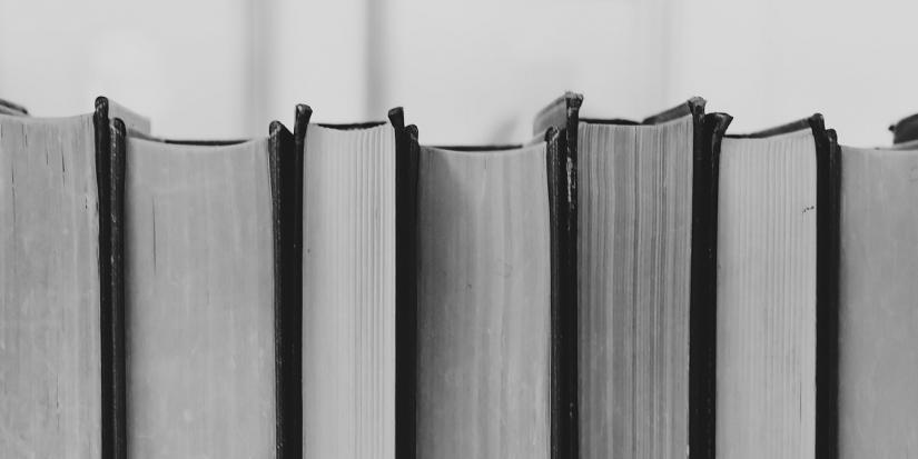 Black and white image of books.