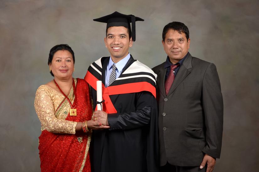 Professional photo of graduate and family