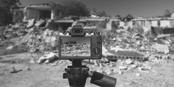 Camera taking picture of rubble.