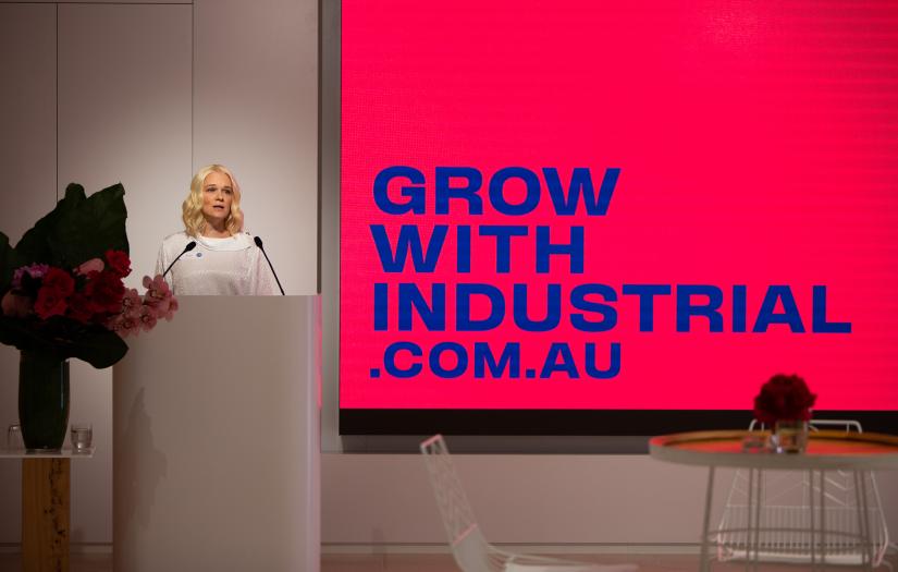 ellen slaven presenting in front of a screen "growwithindustrial.com.au"