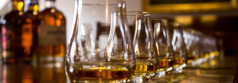 whisky tasting glasses in a row
