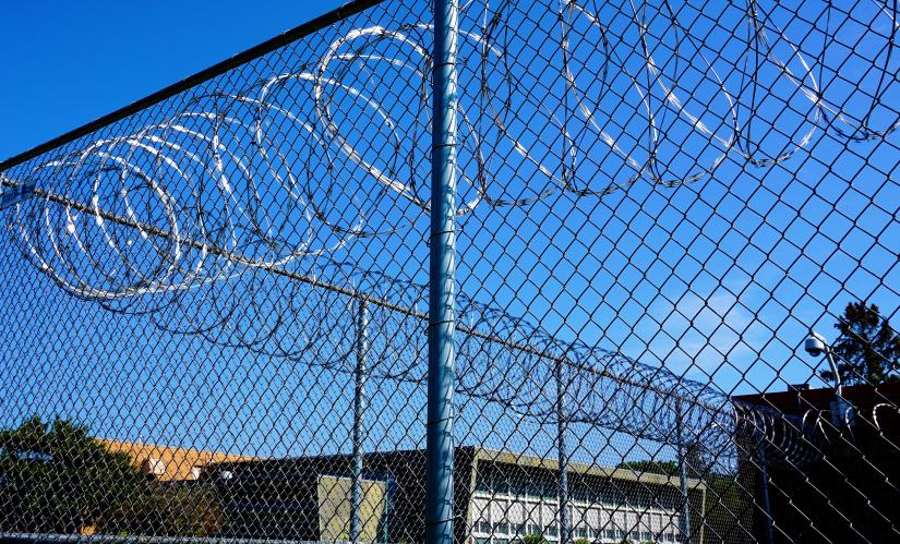 Stock picture of a detention centre fence line