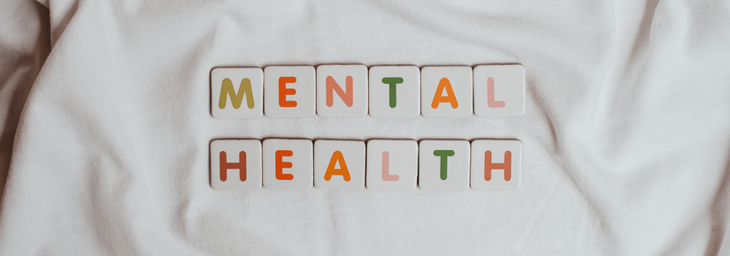 The coloured text 'mental health' on tiles