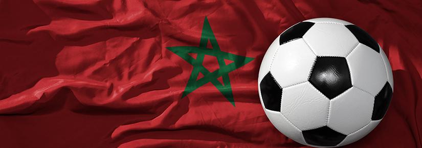 Adobe Stock picture of a soccer ball superimposed on the Moroccan flag