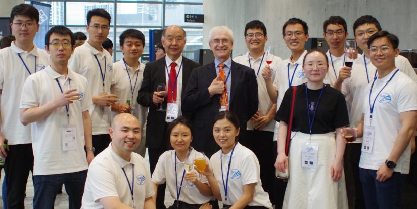 Group of student volunteers with two Professors