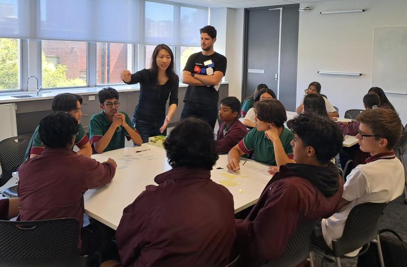 high school students in a classroom at UTS with a teacher