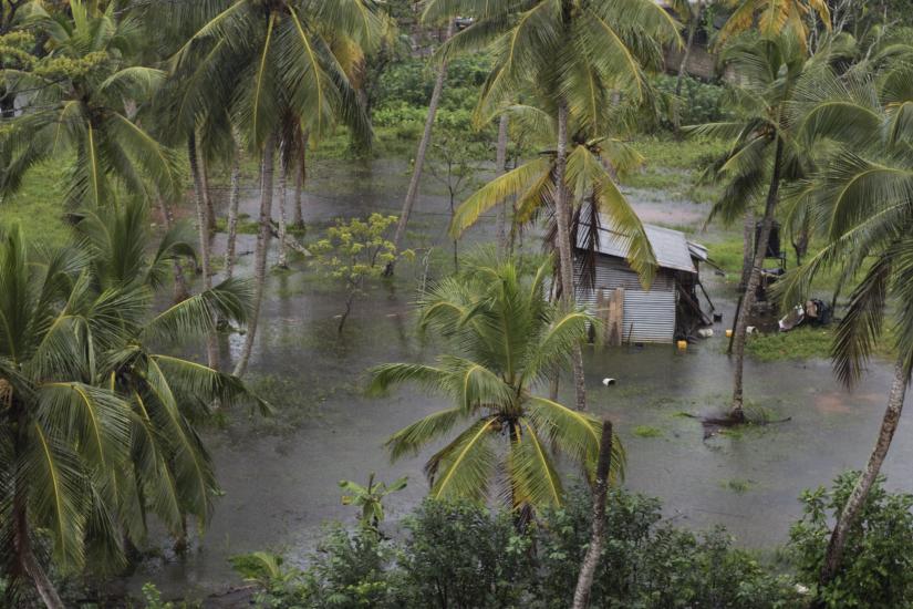 Image of south east asian house being flooded