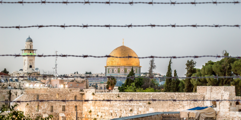Image of Al Aqsa mosque behind barbed wires