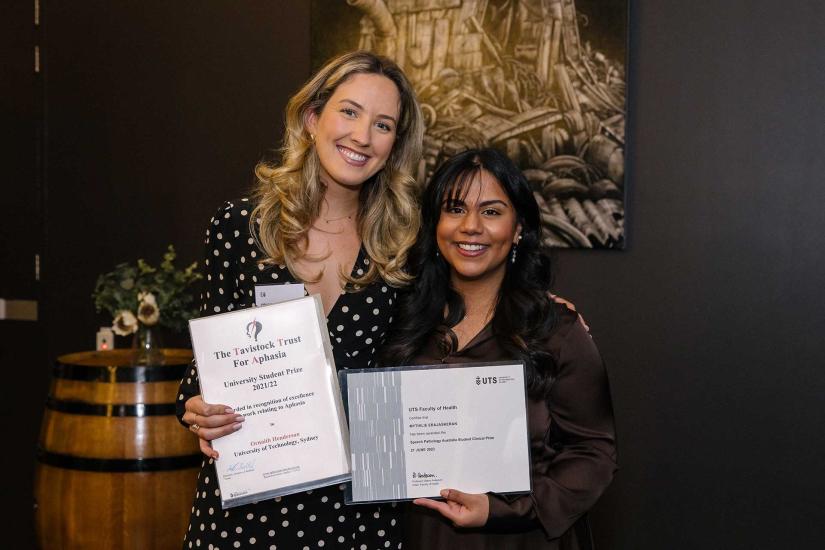 Ornaith Henderson and Mythilie Erajaskeran with their awards