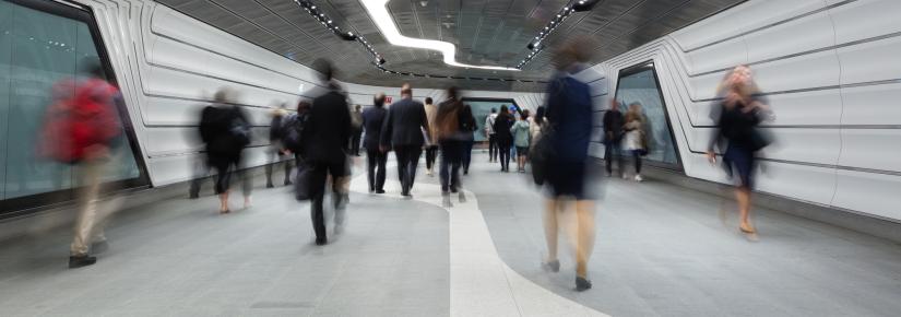 Blurred out, these images show office workers on their way to or from their jobs.