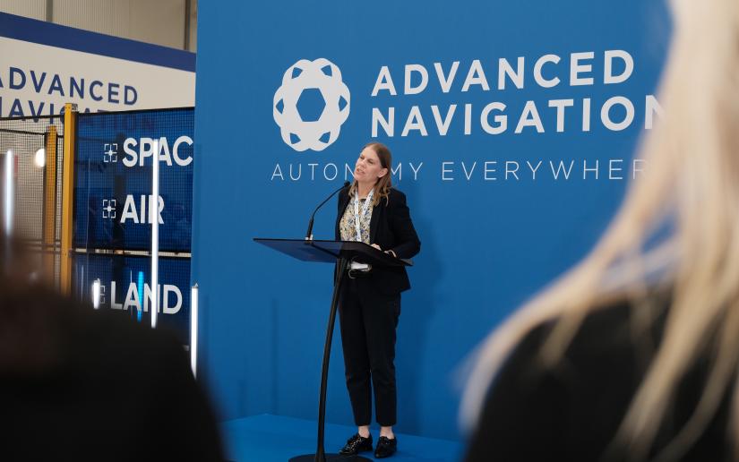 Peta Wyeth speaks at a lectern during the Advanced Navigation launch event at Tech Lab.