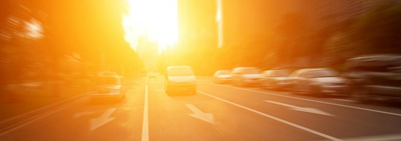 Stock picture of bright sun beating down of a city street