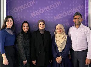 Four members of the Neao Health staff pose for a photo with Pharmacy student, Sanna Fatima Saleem.