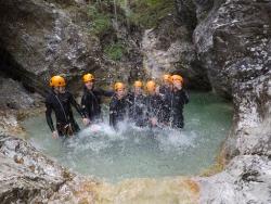 FASS ICS Spain study tour Ben with friends standing under a waterfall