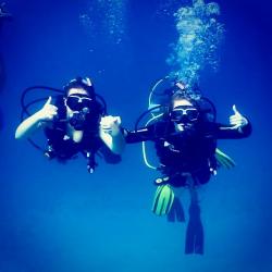 Velvet-Belle scuba diving with a friend