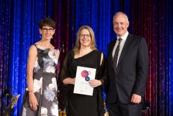 Nicole Heneka receiving award from Palliative Care Australia President, Dr Jane Fischer