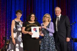 Professor Meera Agar and PEACH team receiving award from Palliative Care Australia President, Dr Jane Fischer