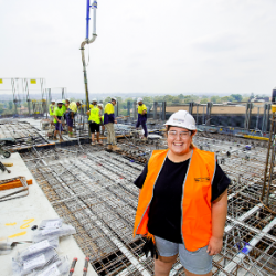 woman in high vis on construction site