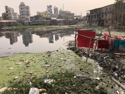 Contaminated river next to slums