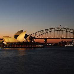 opera house and harbour bridge at night