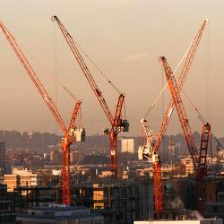 Cranes against a dusty skyline