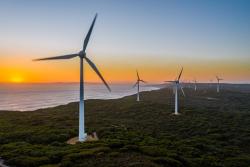 Wind turbines at sunset