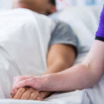 UTS Nursing student comforts a patient