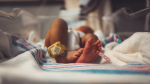 newborn baby feet with hospital tags