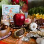 Various items on a decorative cloth to celebrate Nowruz
